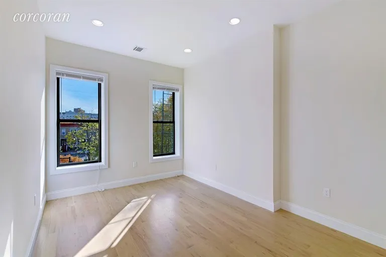 New York City Real Estate | View 488A Chauncey Street | Bright, Tree Top View Bedroom | View 5