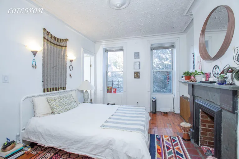 New York City Real Estate | View 285 7th Street | Third Floor -Master Bedroom with decorative Mantle | View 2