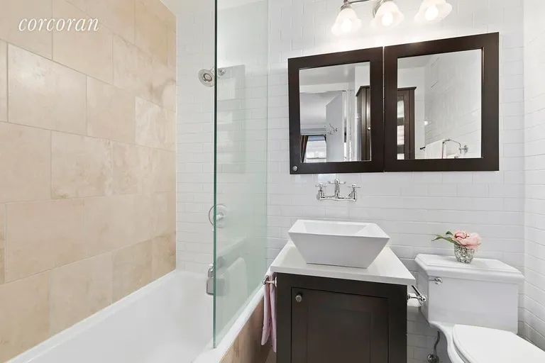 New York City Real Estate | View 123 East 75th Street, 3C | Fully Renovated Bathroom with Contemporary Fixture | View 6
