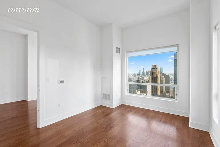 New York City Real Estate | View 250 East 49th Street, 19D | Bedroom | View 4