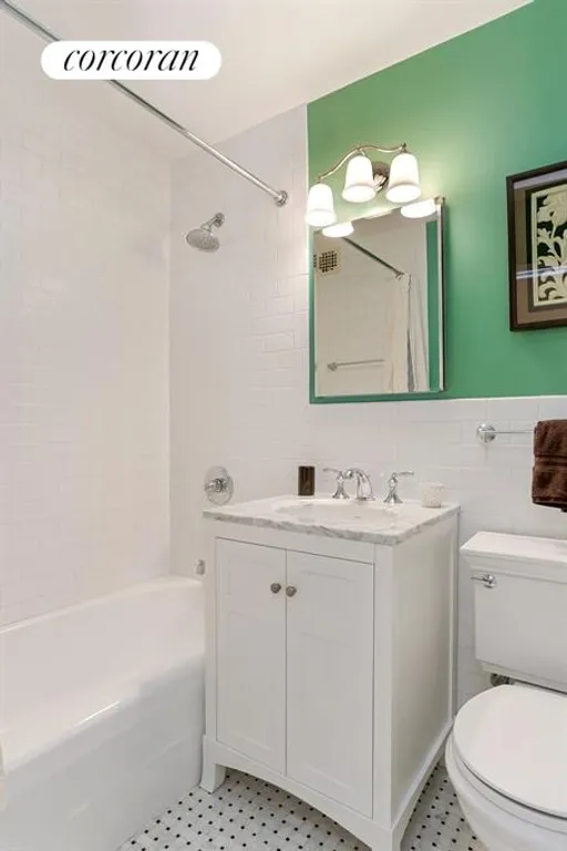 New York City Real Estate | View 160 West End Avenue, 5A | New bathroom with crisp white tiles & mosaic floor | View 5