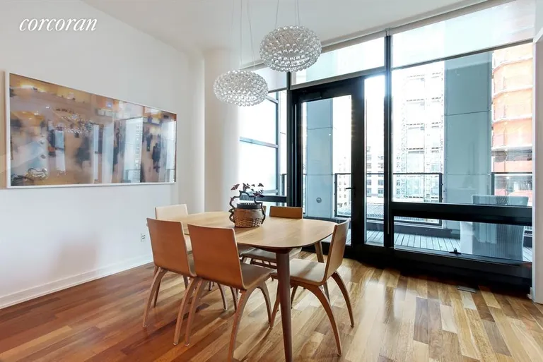 New York City Real Estate | View 101 Warren Street, 7J | Dining Room Overlooks Beautiful Outdoor Space | View 6