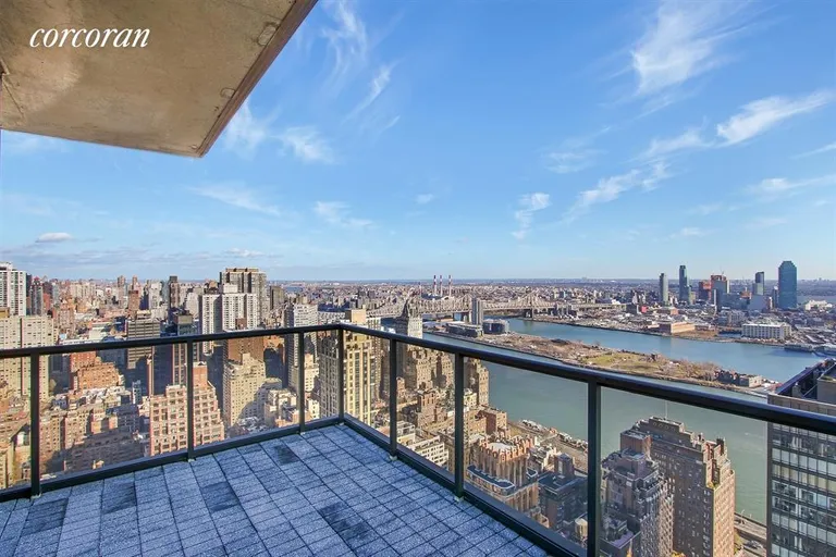 New York City Real Estate | View 100 United Nations Plaza, 48A-PH | Entertain on a view drenched balcony. | View 10