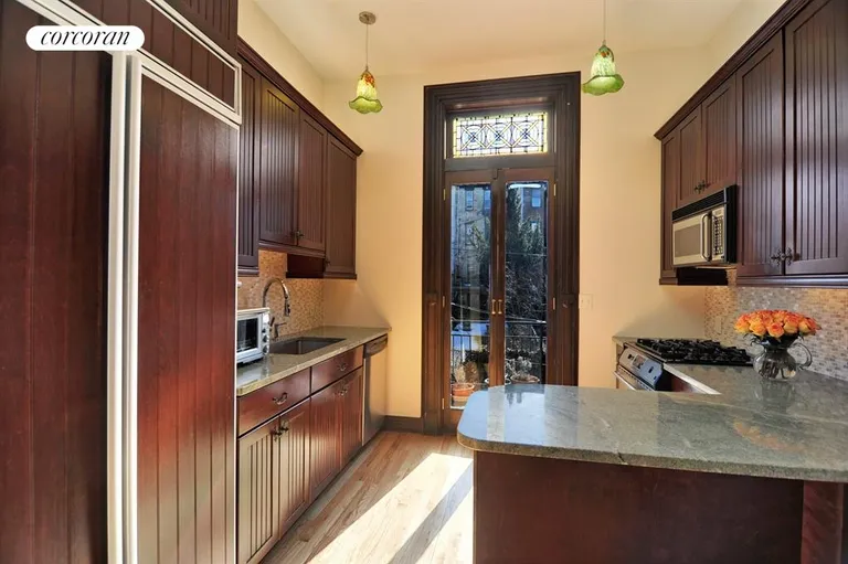 New York City Real Estate | View 140 Saint Johns Place | Parlor Level Kitchen | View 7