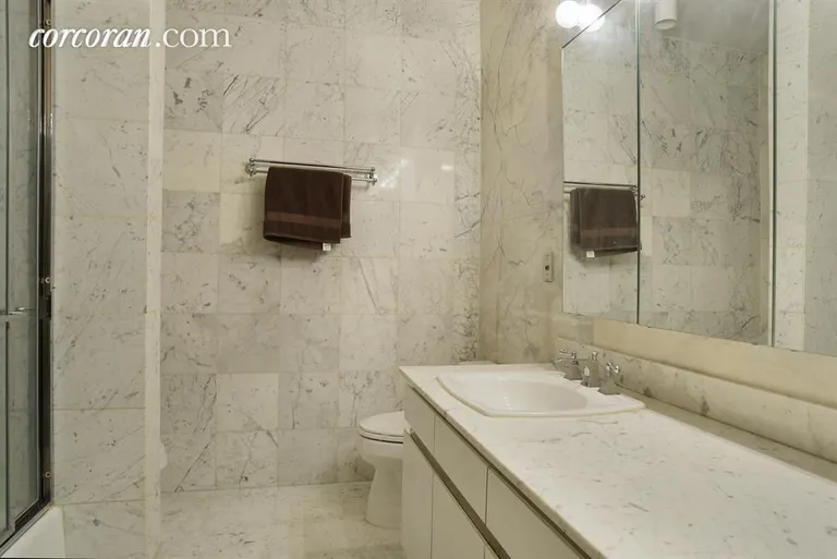 New York City Real Estate | View 167 East 61st Street, 24-B | Master Bathroom | View 4