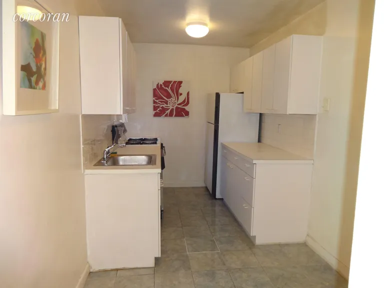 New York City Real Estate | View 2102 Holland Avenue, 2A | Windowed Kitchen | View 5