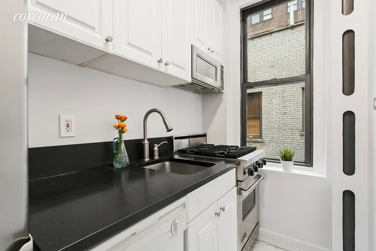 New York City Real Estate | View 225 West 25th Street, 6A | Windowed Modern Kitchen | View 4