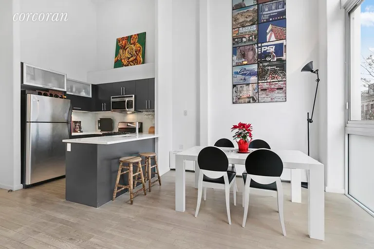 New York City Real Estate | View 406 Lorimer Street, D | Open Kitchen and Dining Area | View 2