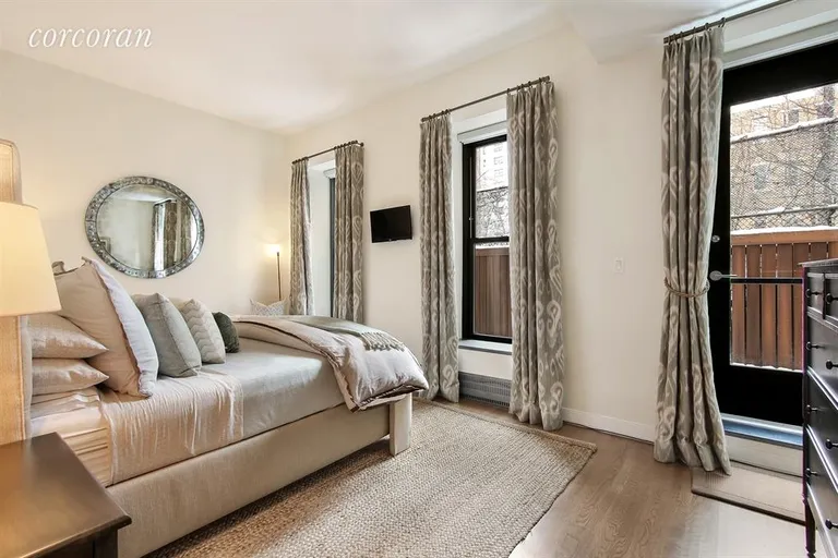 New York City Real Estate | View 422 West 20th Street, PARLOR A | Master Bedroom that opens to private patio  | View 6