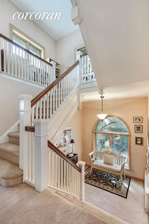 New York City Real Estate | View 75 82nd Street | Sweeping Staircase with Gracious Landing  | View 7