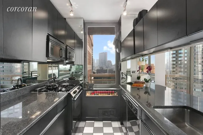 New York City Real Estate | View 500 West 43rd Street, 34A | A sleek galley kitchen with a window!   | View 2
