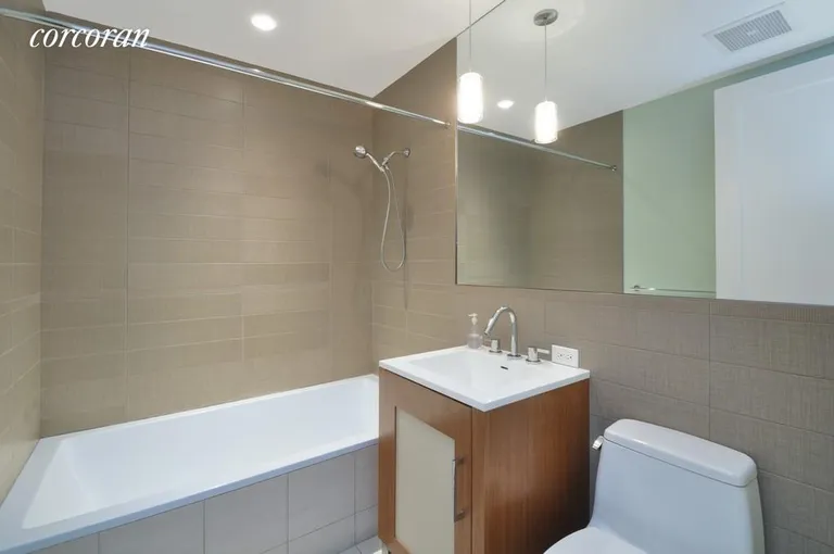 New York City Real Estate | View 125 North 10th Street, S4D | Second Bathroom with Large Soaking Tub | View 8