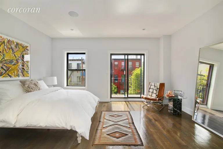 New York City Real Estate | View 52 Harman Street | Master Bedroom with Balcony | View 4
