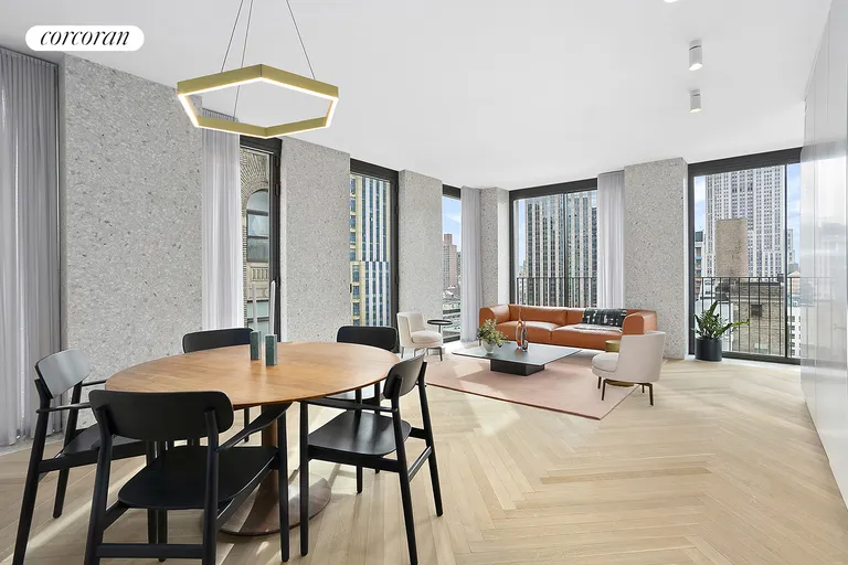 New York City Real Estate | View 16 West 40th Street, 21D | South-facing Corner Living Room | View 2