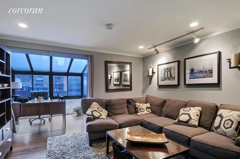 New York City Real Estate | View 225 East 86th Street, 802 | Living Room and Atrium | View 2