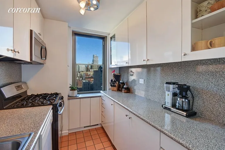 New York City Real Estate | View 301 East 79th Street, 10B | Windowed renovated kitchen | View 4