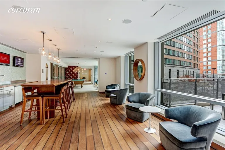New York City Real Estate | View 2 River Terrace, 5L | Common Room with Kitchen | View 10