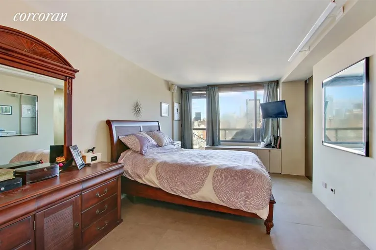 New York City Real Estate | View 270 West 17th Street, 19B | Large Master Bedroom with Balcony | View 4