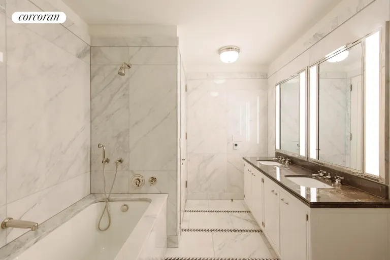 New York City Real Estate | View 155 West 11th Street, 5K | Marble Master Bathroom with stall shower and tub | View 5