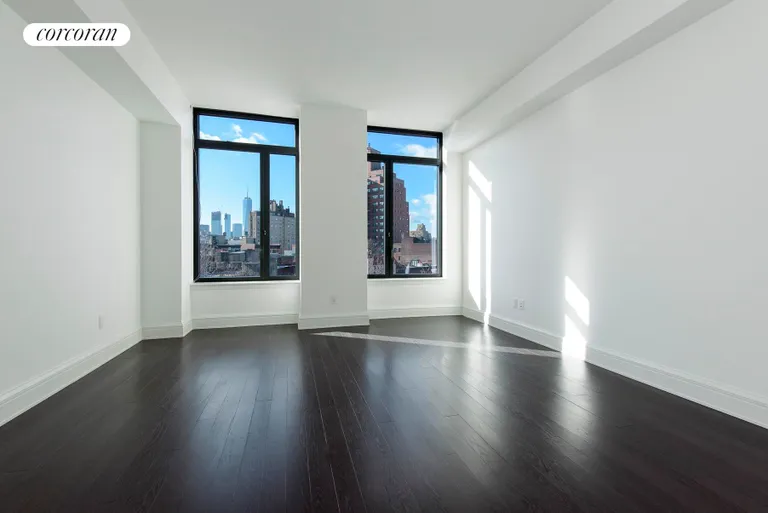 New York City Real Estate | View 155 West 11th Street, 5K | Master Bedroom with View to Freedom Tower | View 3