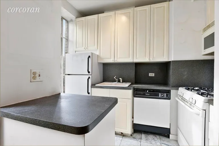 New York City Real Estate | View 353 West 56th Street, 7E | Windowed Kitchen | View 3