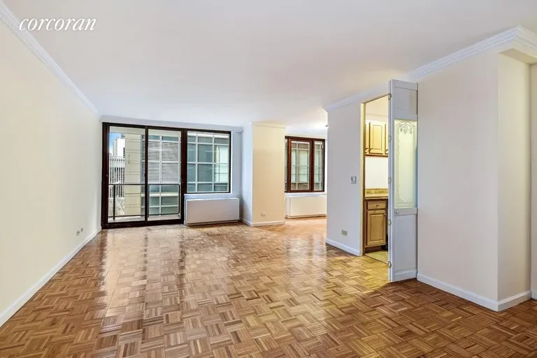 New York City Real Estate | View 161 West 61st Street, 6C | Large Living Room with Balcony and Washer/Dryer | View 5