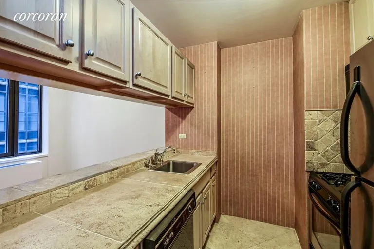 New York City Real Estate | View 161 West 61st Street, 6C | Pass-Through Kitchen and Stainless Appliances | View 6