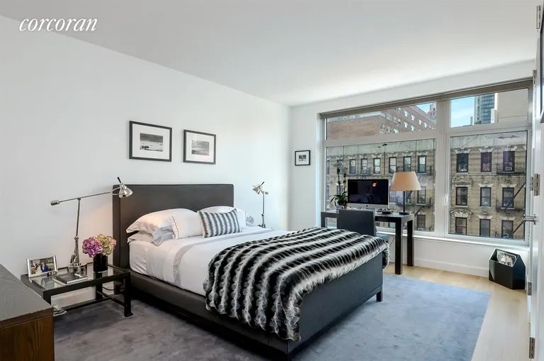 New York City Real Estate | View 400 East 67th Street, 5C | Master Bedroom overlooks First Avenue | View 3