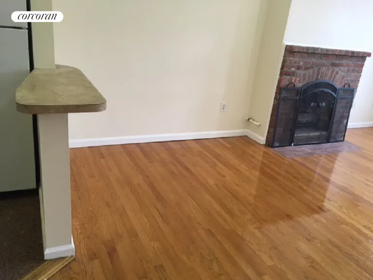 New York City Real Estate | View 7409 3rd Avenue, 3 | Working fire place. | View 4