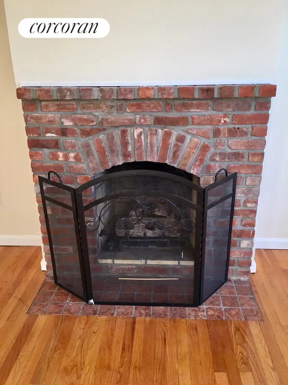 New York City Real Estate | View 7409 3rd Avenue, 3 | Fireplace | View 3