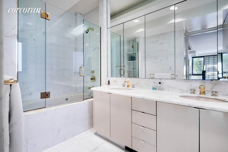 New York City Real Estate | View 100 United Nations Plaza, 4AB | Windowed Master Bathroom with Double Sinks | View 7