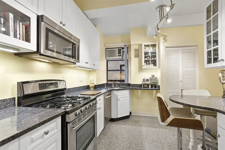 New York City Real Estate | View 220 West 93rd Street, 7A | Eat-in windowed chef's kitchen with washer & dryer | View 2