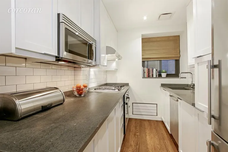 New York City Real Estate | View 422 West 20th Street, PARLOR B | Windowed Kitchen | View 3