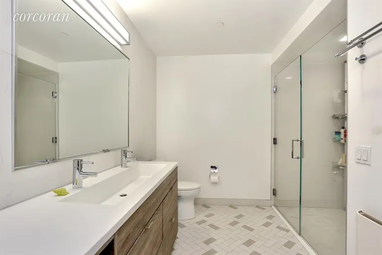 New York City Real Estate | View 23 West 116th Street, 2J | Master Bathroom - Double Sink and large shower | View 4