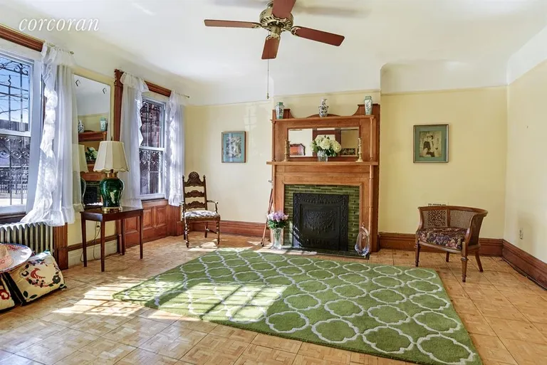 New York City Real Estate | View 345 Gates Avenue | Spacious garden level sitting room | View 5