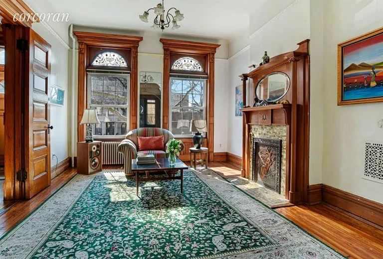 New York City Real Estate | View 345 Gates Avenue | Sun bathed front parlor | View 2