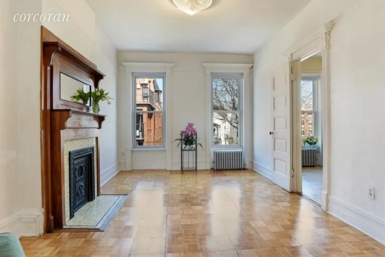New York City Real Estate | View 345 Gates Avenue | Open and airy living room in top unit | View 9