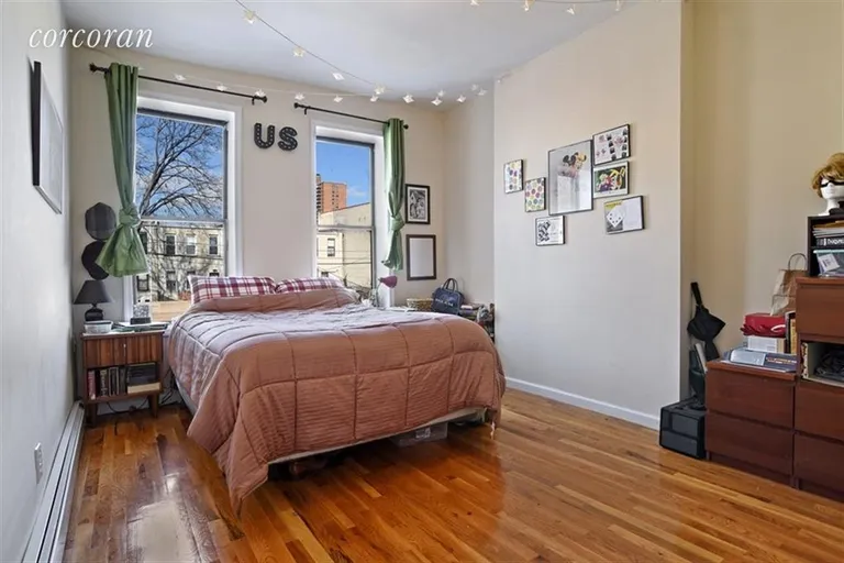 New York City Real Estate | View 1855 Prospect Place | Bedroom with en suite bathroom | View 5