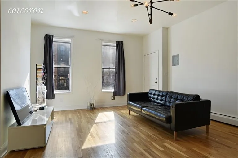 New York City Real Estate | View 1855 Prospect Place | Living room | View 12