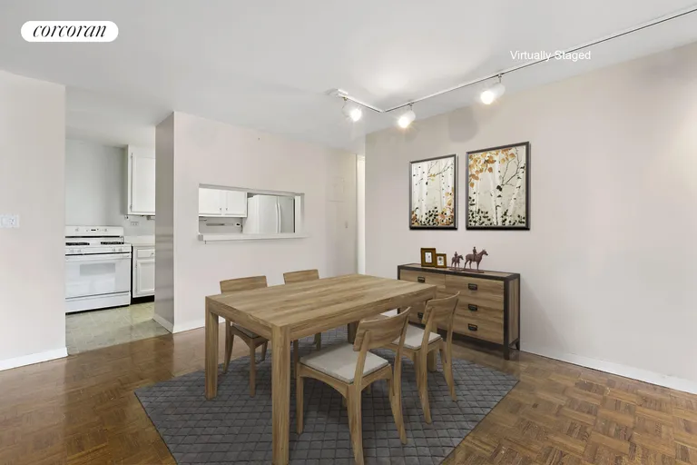New York City Real Estate | View 531 Main Street, 909 | dining area / galley kitchen with pass-through | View 2