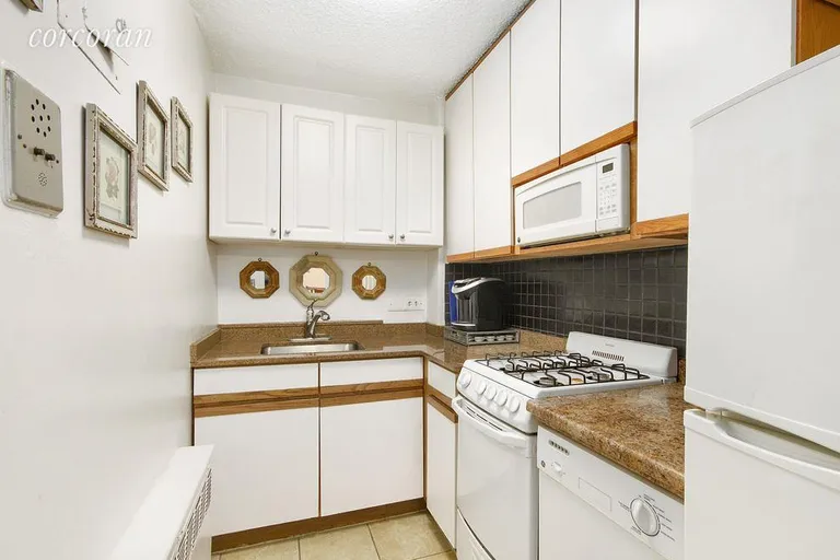 New York City Real Estate | View 77 East 12th Street, 10B | Kitchen with Dishwasher | View 6