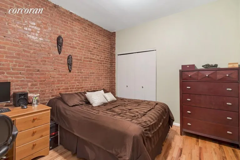 New York City Real Estate | View 333 East 92nd Street, 4B | Second bedroom with exposed brick | View 6