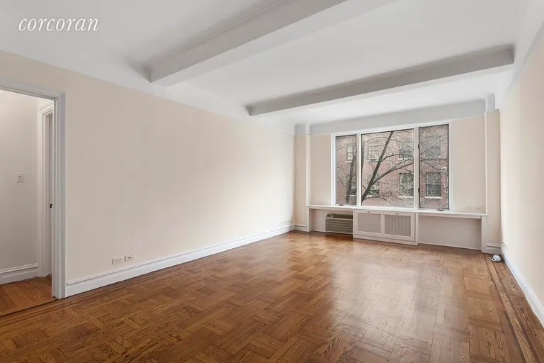 New York City Real Estate | View 108 East 91st Street, 3B | Sunny Living Room with Tree-Top Views! | View 2