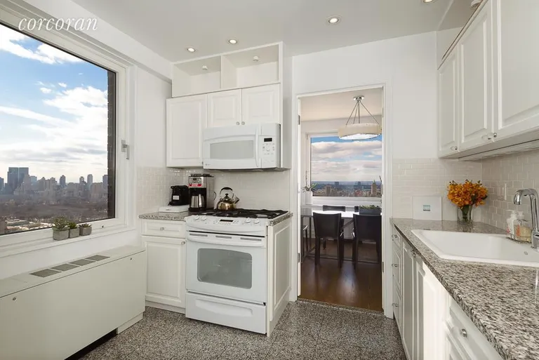 New York City Real Estate | View 45 East 89th Street, 40EFG | Windowed Kitchen | View 6