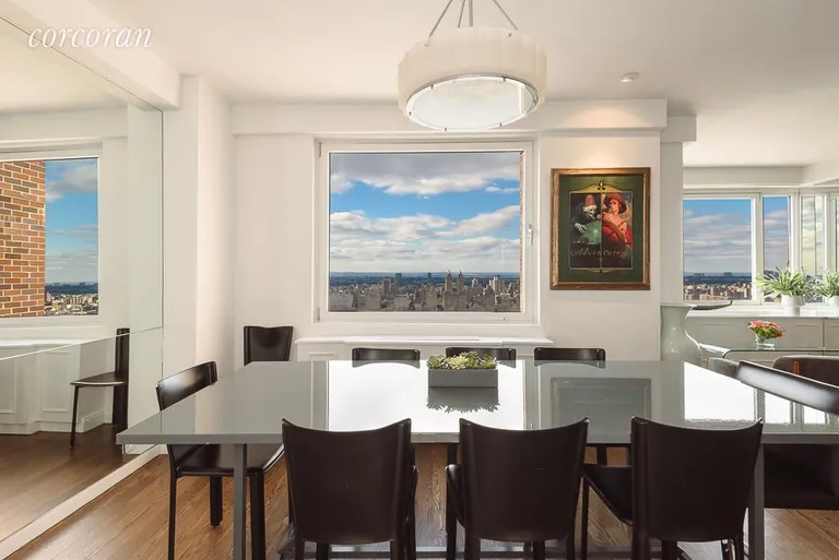 New York City Real Estate | View 45 East 89th Street, 40EFG | Dining Room with Central Park Views | View 5