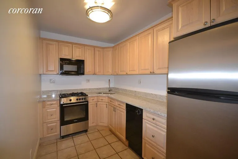 New York City Real Estate | View 25 West 70th Street, 2B | Brand new stone counter top and faucet | View 4
