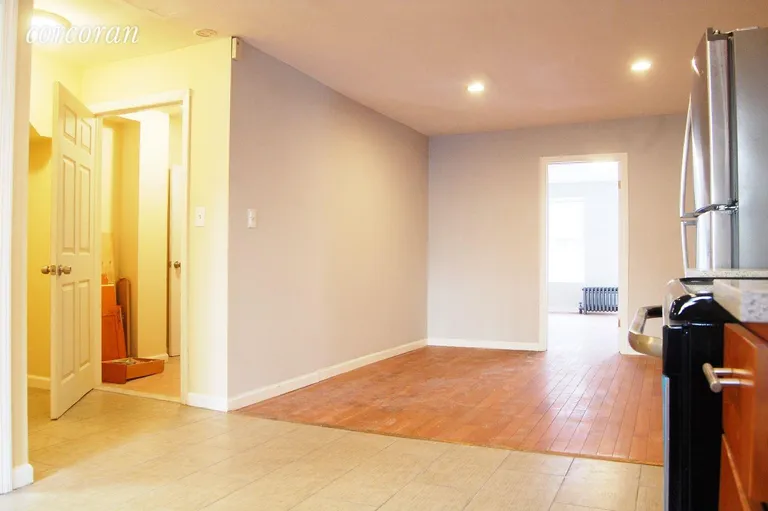 New York City Real Estate | View 365 Monroe Street, 1 | Living Room + Entry Foyer | View 5