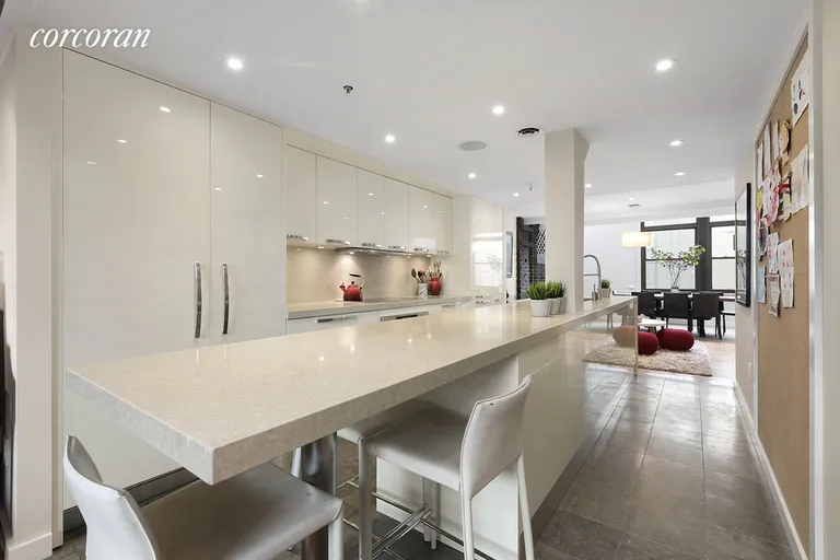 New York City Real Estate | View 260 West 22nd Street, PH4 | Gourmet Kitchen with 16-foot Center Island | View 2