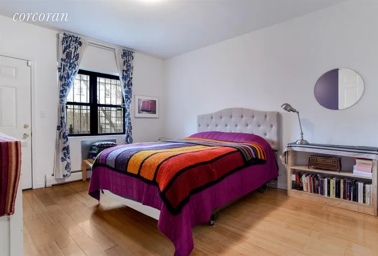 New York City Real Estate | View 31 Covert Street, 1 | Master Bedroom with en suite bath | View 3