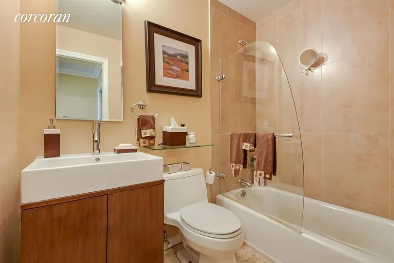 New York City Real Estate | View 301 East 79th Street, 17P | renovated tile bathroom | View 6